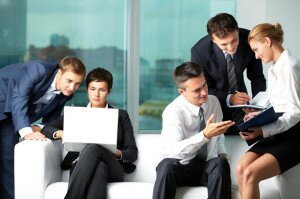 Groups of workers collaborating.
